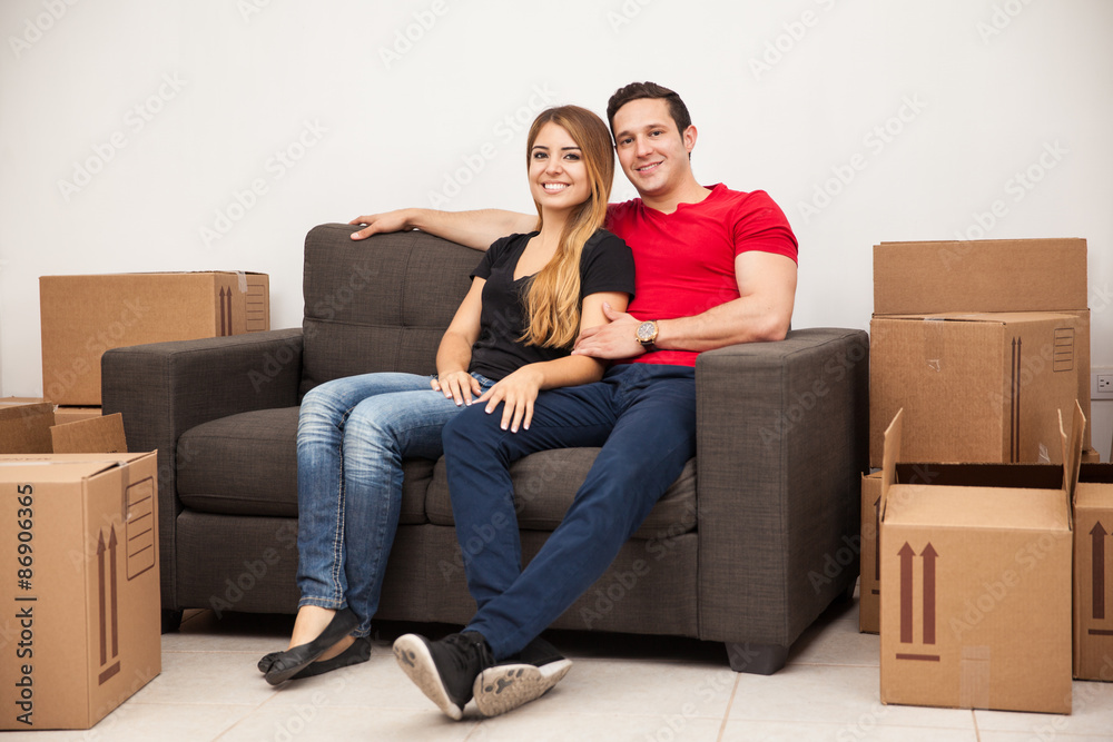 Couple taking a break from moving Couple taking a break from moving