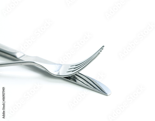 close up dinning silverware fork and knife on white background