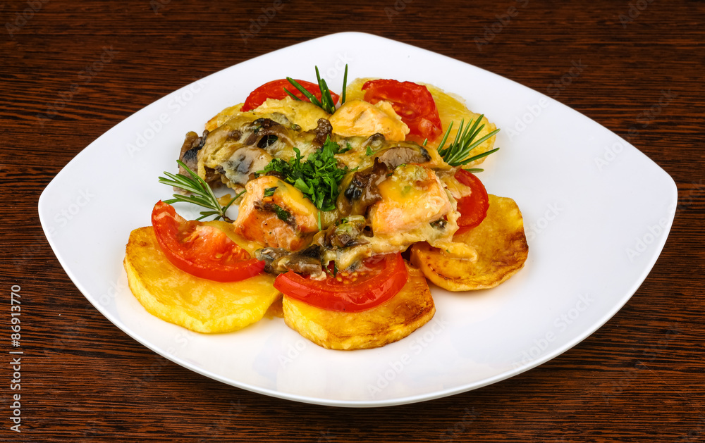 Roasted salmon with potato and tomato Roasted salmon with potato and tomato