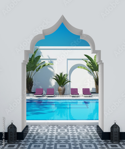 Moroccan riad courtyard with a swimming pool photo