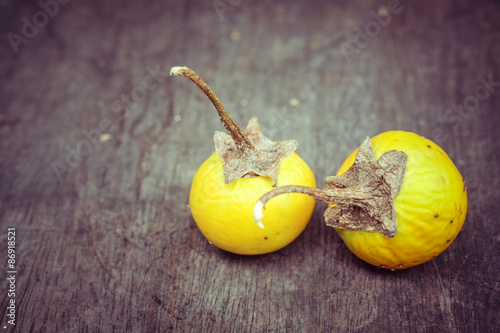 Foto Yellow eggplants with filter effect retro vintage style