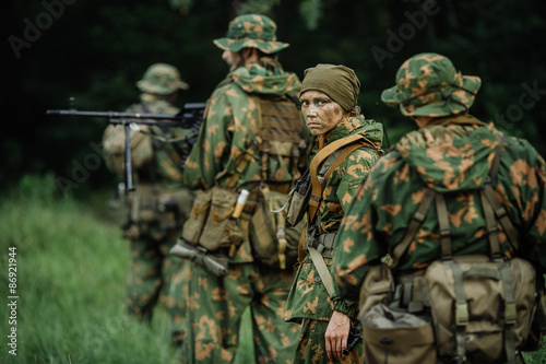 Group of soldiers special forces during the raid in the forest © kaninstudio