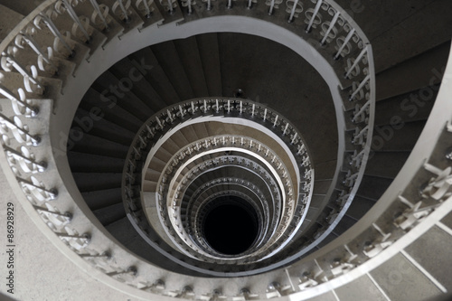 Spiral staircase in a building with many levels