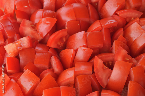 Chopped tomatoes pieces © cobracz