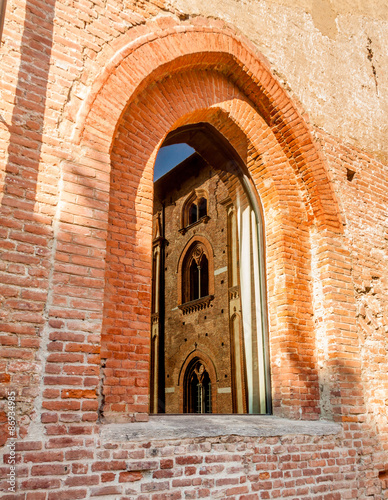 Visconti-Sforza castle in Vigevano. Building reflected in a wind