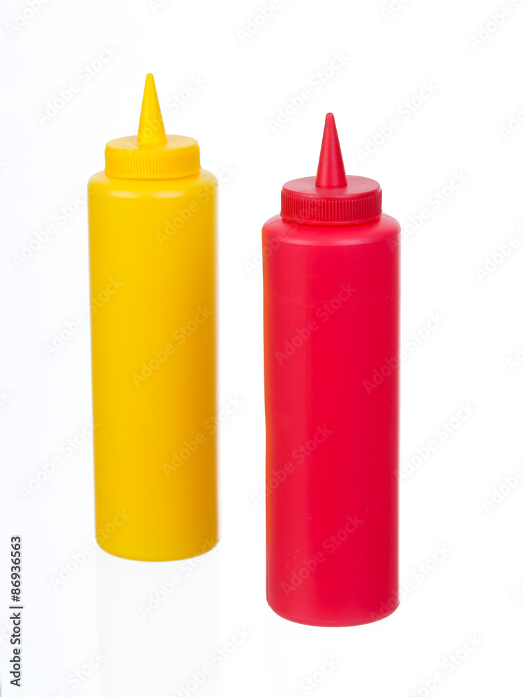Mustard and ketchup plastic bottles isolated on white background