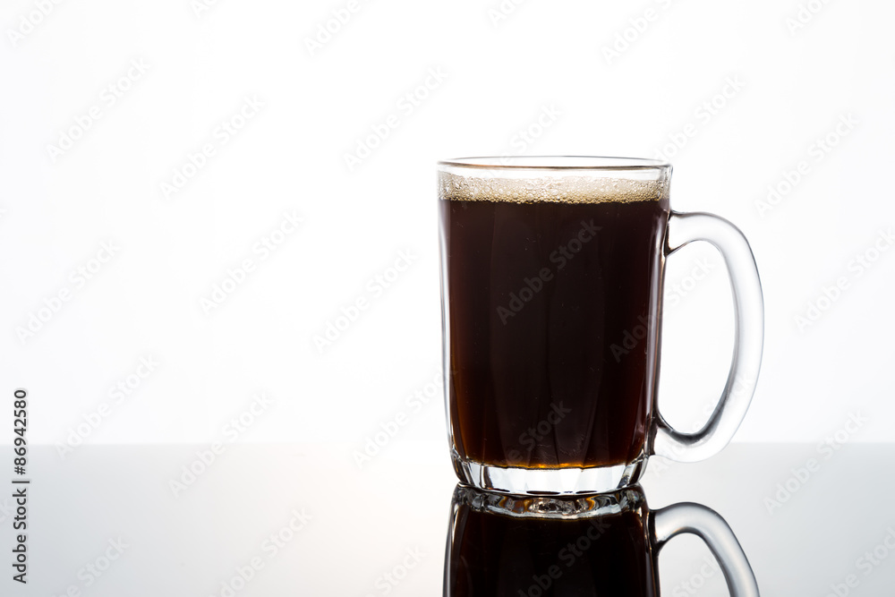 Aromatic hot black coffee in a transparent glass Aromatic hot black coffee in a transparent glass