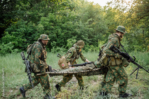 a military doctor to help the wounded soldier