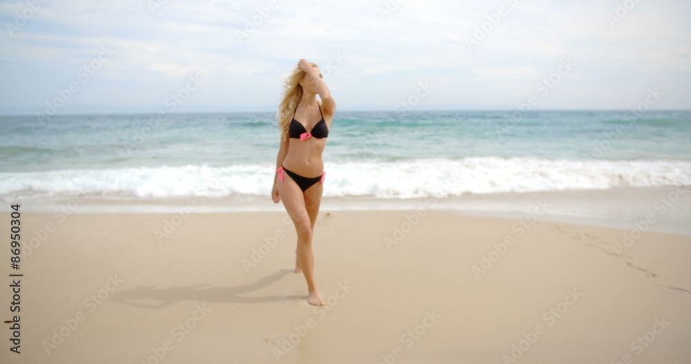 Blond Woman in Black Bikini Standing on Beach Blond Woman in Black Bikini Standing on Beach