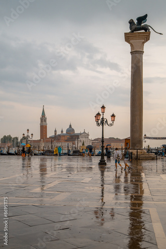 People with umbrellas on the waterfront in Venice © hibox777