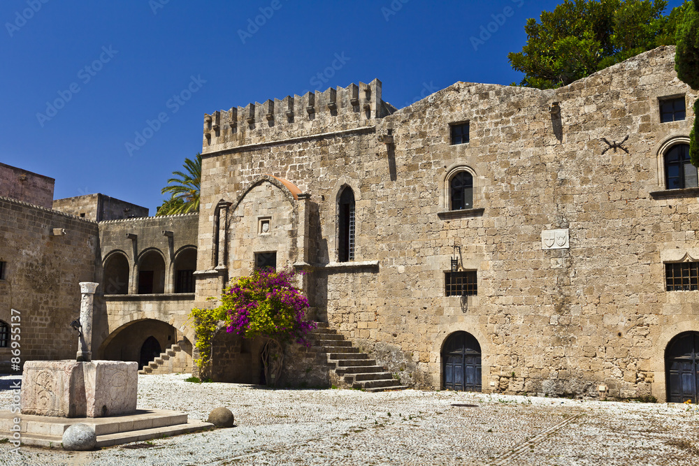 Medieval buildings at the Argirokastrou Square in the old town of Rhodes, Greece.