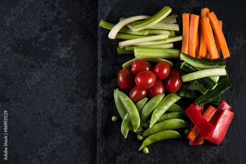 Fresh organic vegetables and vibrant dip selection