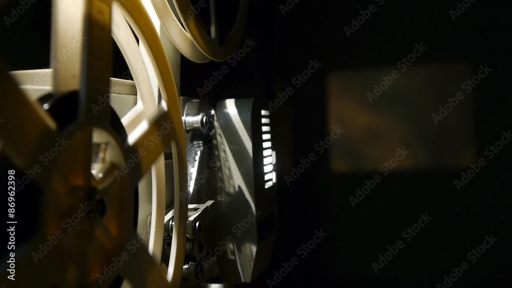 Vintage 8 Mm Movie Projector And Film Reel Closeup - Includes film projector audio