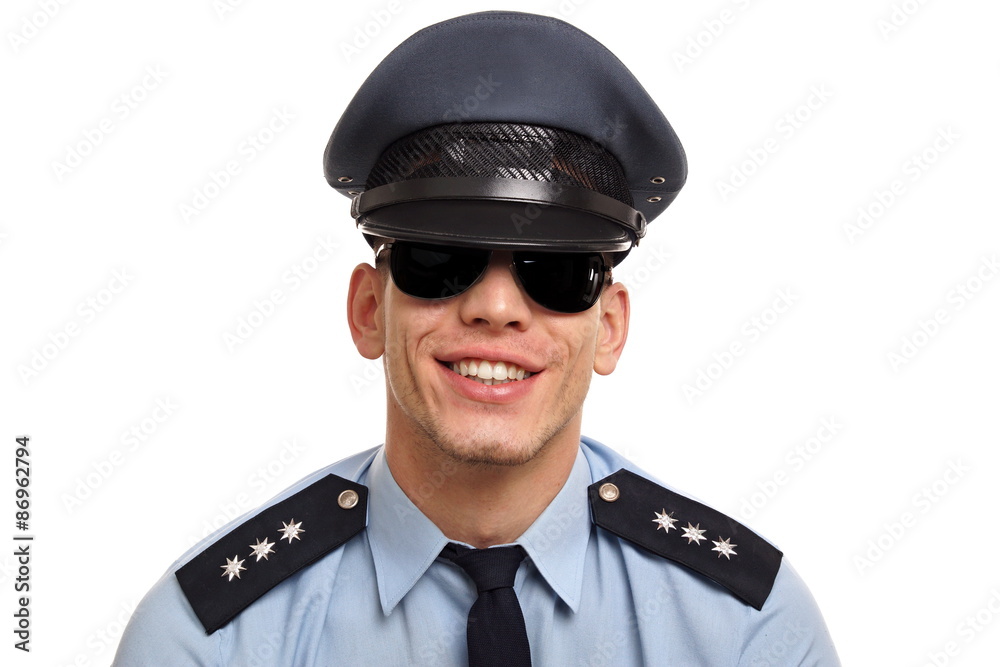 Portrait of smiling policeman in sunglasses on white background Portrait of smiling policeman in sunglasses on white background
