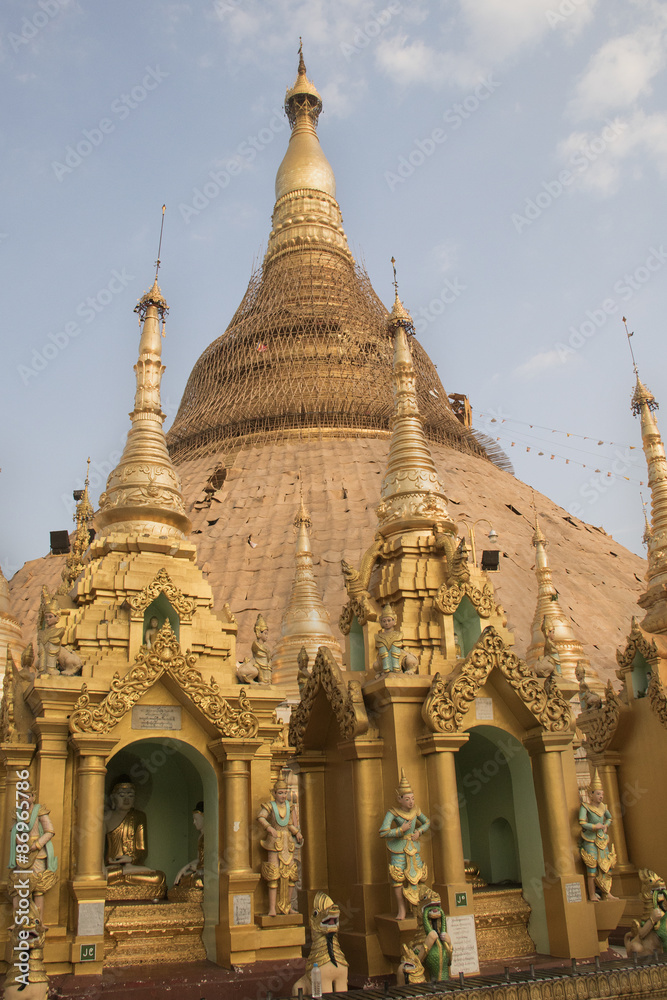 The Great Stupa of the Shwedagon Pagoda is covered in gold leaf which must be restore or replaced every five years or so.Yangon,Myanmar