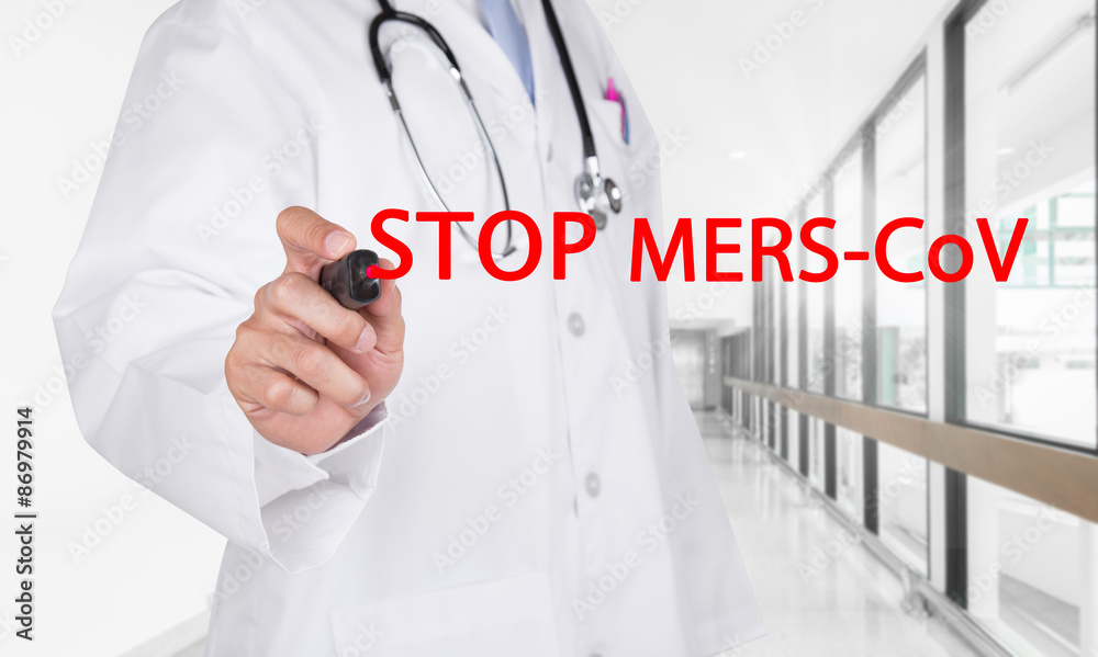 Doctor writing Stop Mers-Cov text on transparent board Doctor writing Stop Mers-Cov text on transparent board