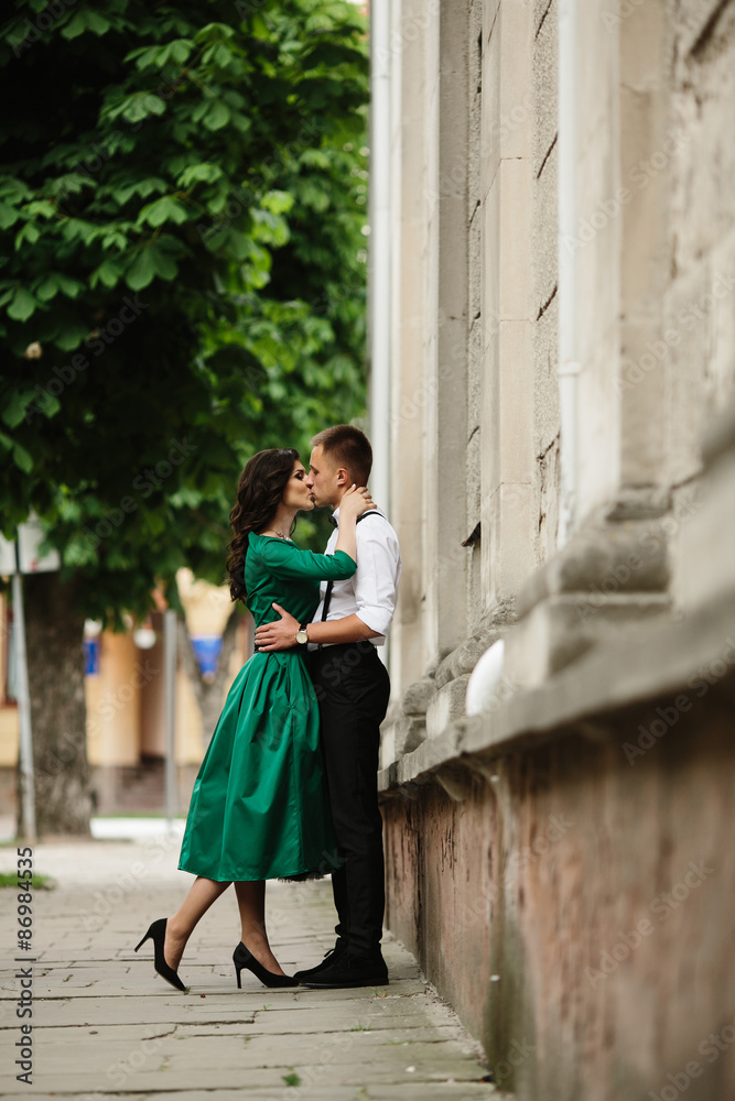 European beautiful couple posing on the street