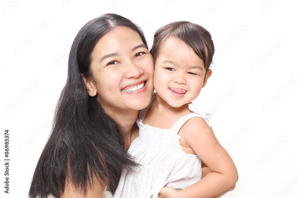 Beautiful Asian Mother and Adorable Baby Girl Hugging with Love and Happiness. Beautiful Asian Mother and Adorable Baby Girl Hugging with Love and Happiness.