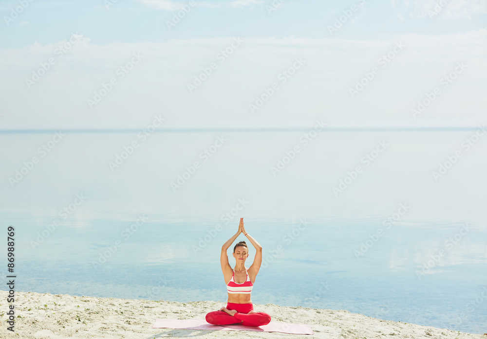 © pressmaster - Exercising by water