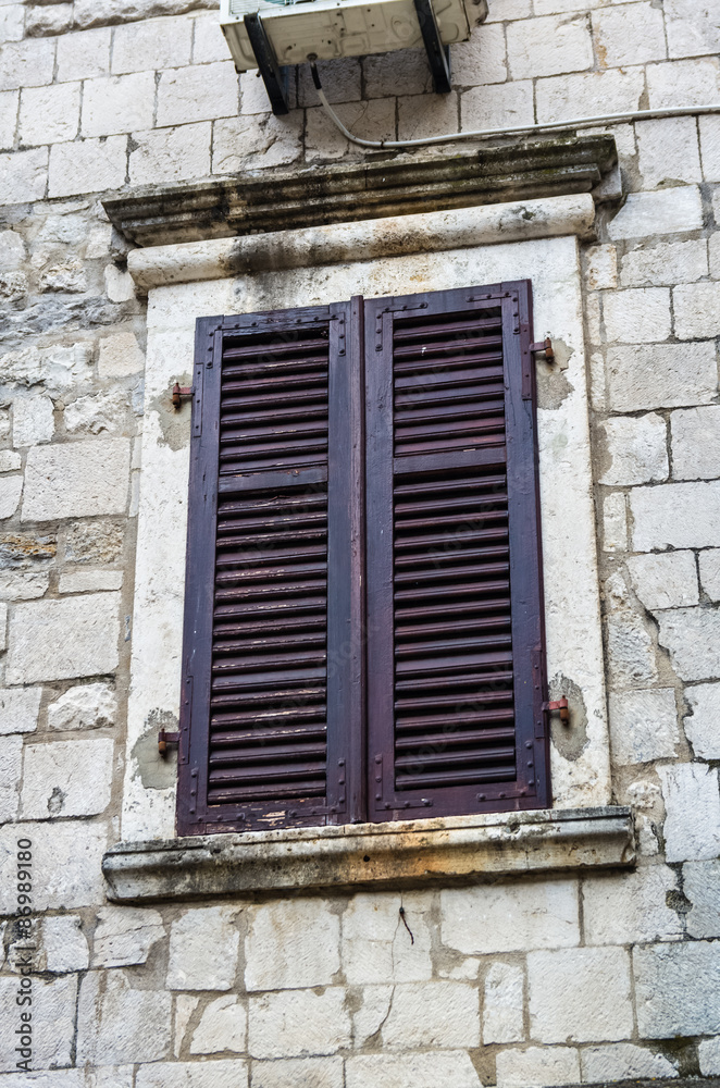 Window with louvers in old house