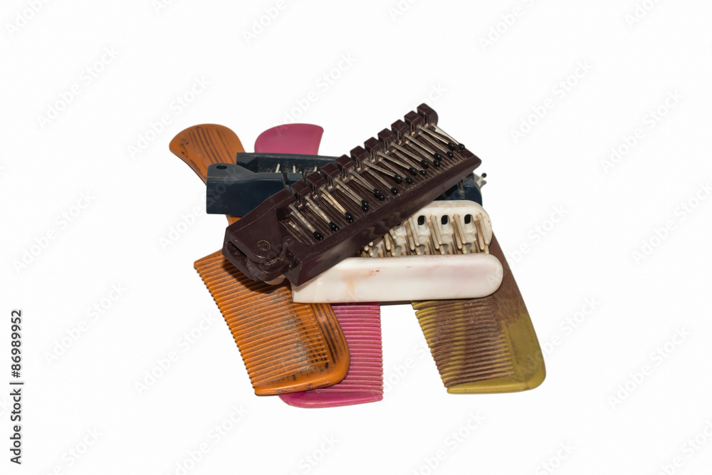 old comb on paper background old comb on paper background