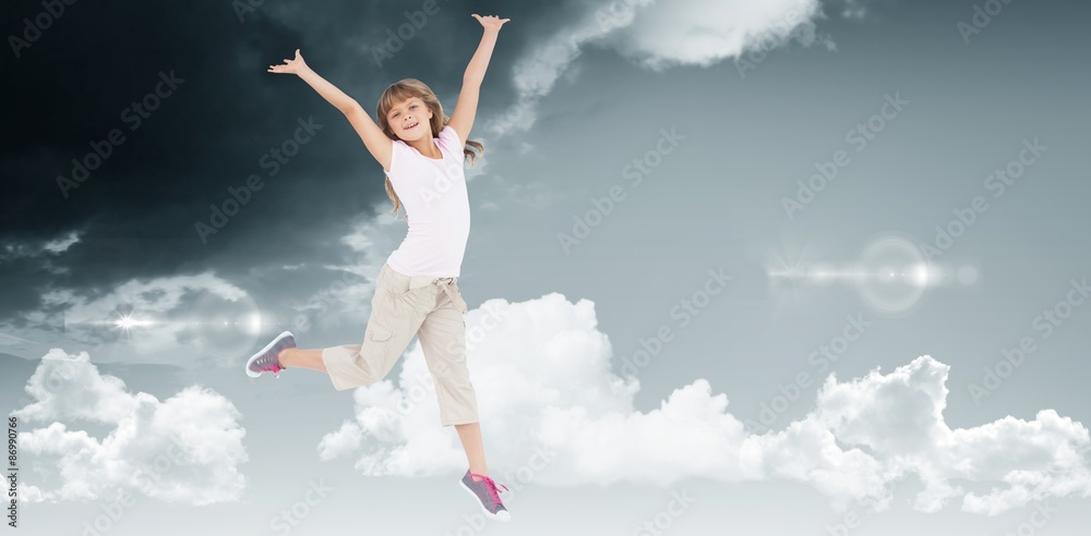 Composite image of happy girl jumping 