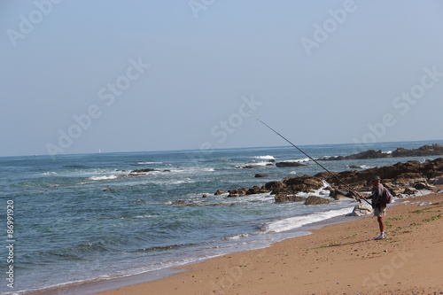 Pêcheur sur la plage