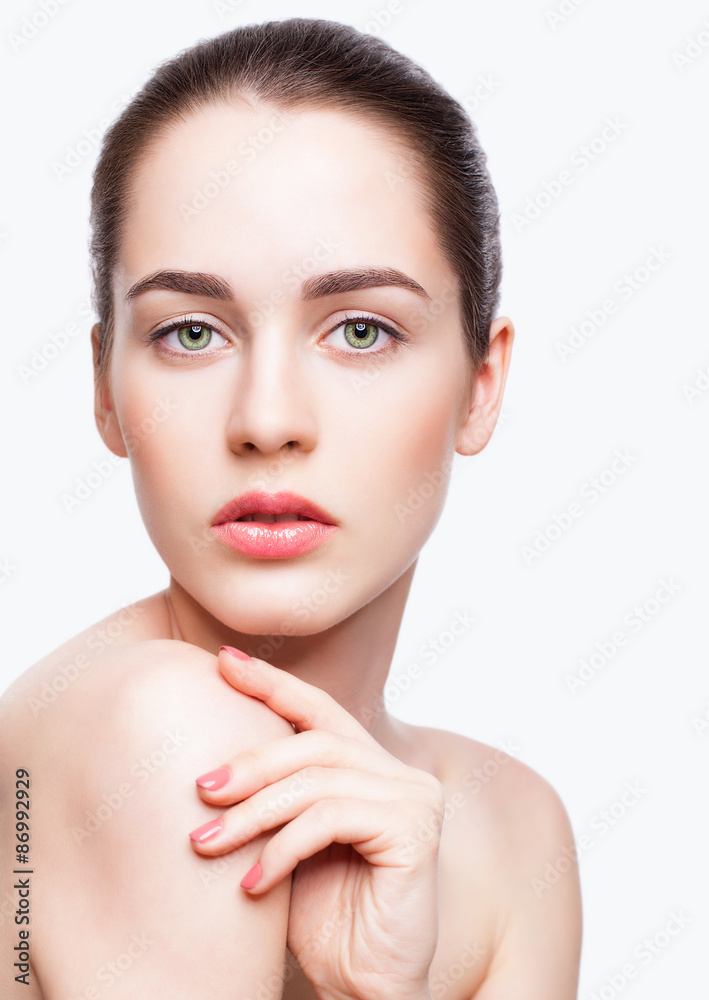 Young beautiful woman with day makeup and green pistachio colou Young beautiful woman with day makeup and green pistachio colou