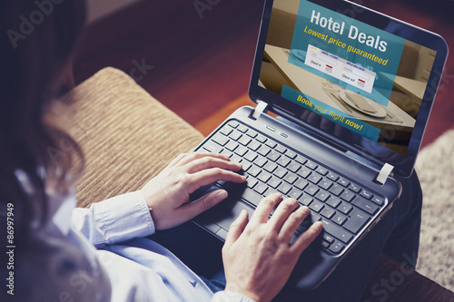 Hotel deals. Woman searching hotel for vacation. Hands typing on keyboard.