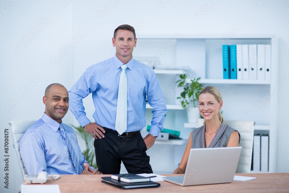 Business partners smiling at camera Business partners smiling at camera