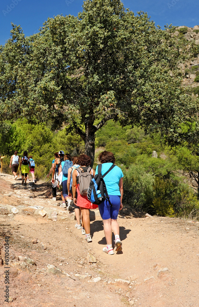 Group of women hikers in the Sierra de Andújar Natural Park, Sierra Morena, province of Jaen, Spain