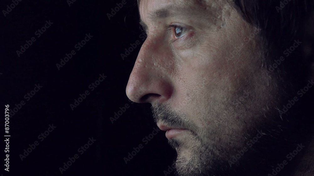 Hypnotized Adult Caucasian Man Watching TV Program in Dark Room Late at Night Hypnotized Adult Caucasian Man Watching TV Program in Dark Room Late at Night