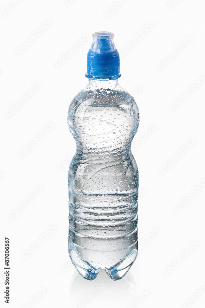 Water. Small plastic water bottle with water drops on white back Water. Small plastic water bottle with water drops on white back
