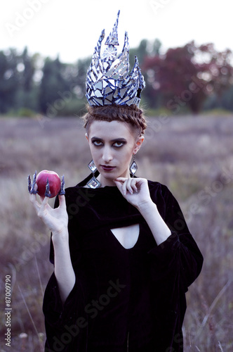 Evil queen with an apple photo