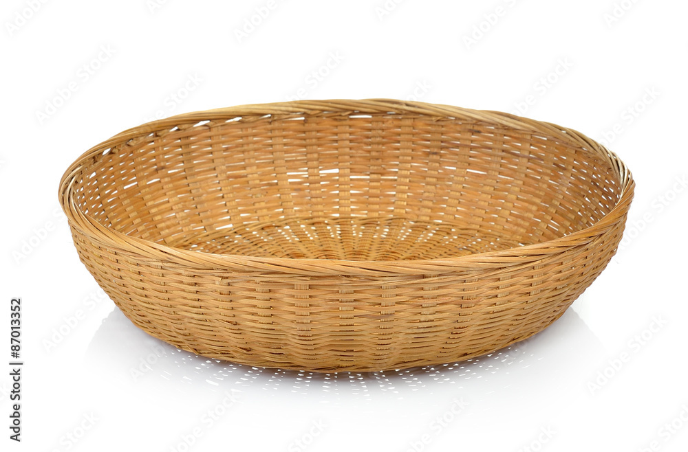 Fototapeta premium Wooden bamboo basket isolated on white background