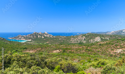 Corsica island, coastal landscape with mountains © evannovostro