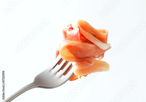 Prosciutto on a fork