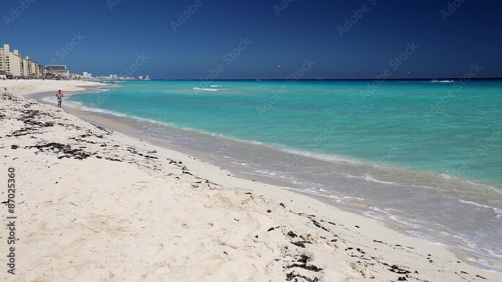 Athletic man jogging on caribbean beach, Cancun, Mexico
Athletic man jogging on caribbean beach, Cancun, Mexico