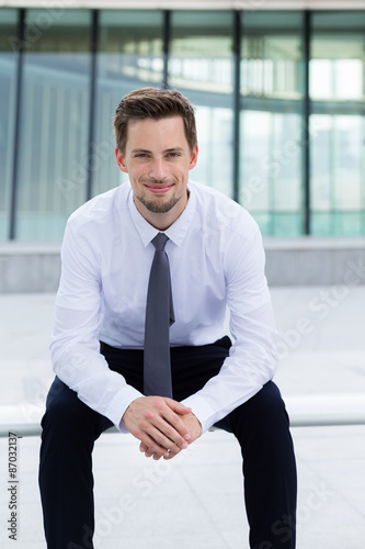 фотографія Businessman sitting on the blench