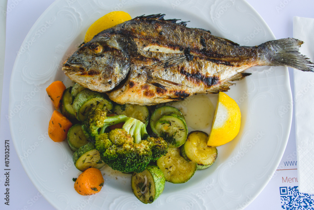 The lunch with fish and vegetable The lunch with fish and vegetable