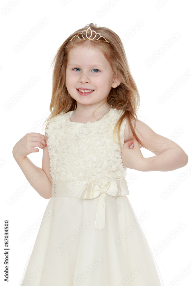 Happy little blonde girl with her hair in braided tiara, long Happy little blonde girl with her hair in braided tiara, long