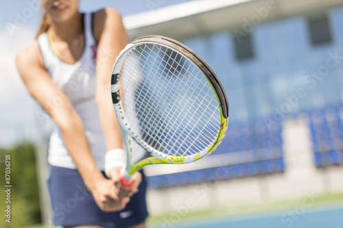 Young woman playing tennis © BGStock72