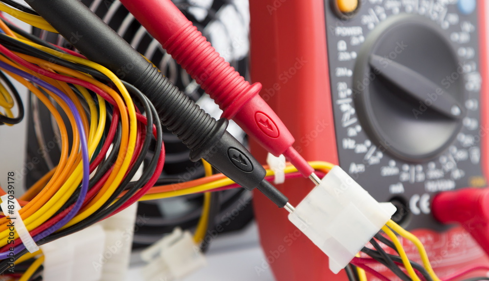 multimeter.measurement of the voltage in the power supply Stock Photo