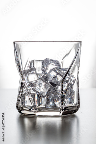 empty glass with ice in the studio