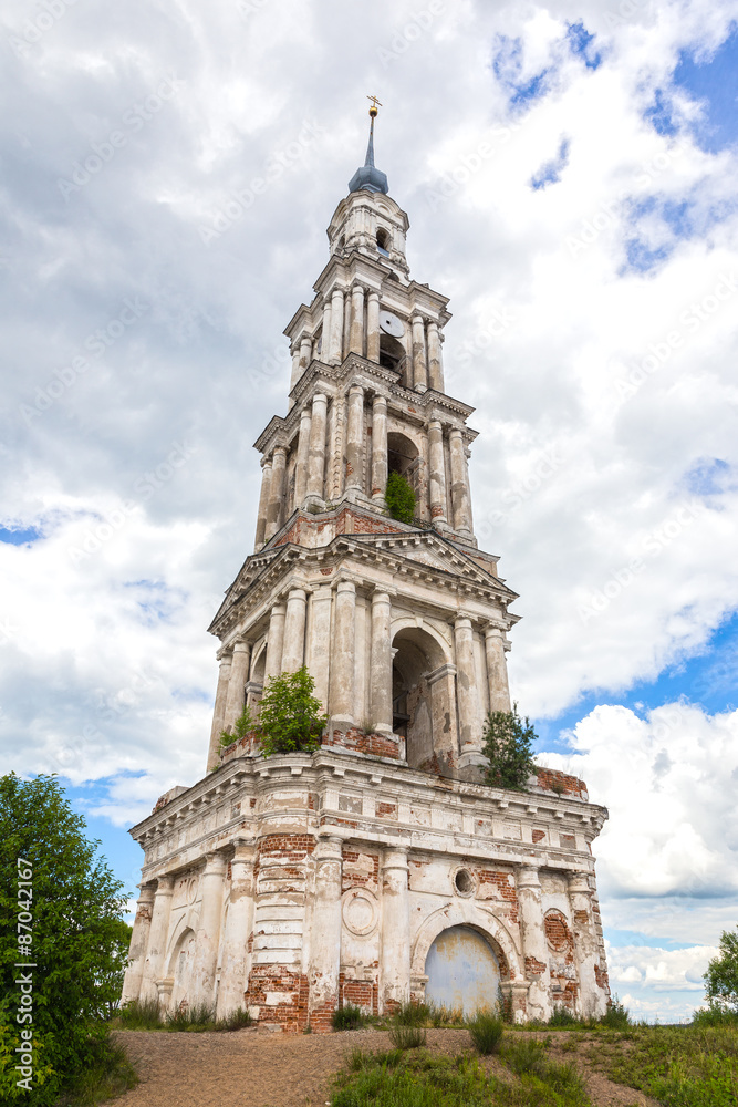 The bell tower of St. Nicholas Cathedral on island. From beach The bell tower of St. Nicholas Cathedral on island. From beach