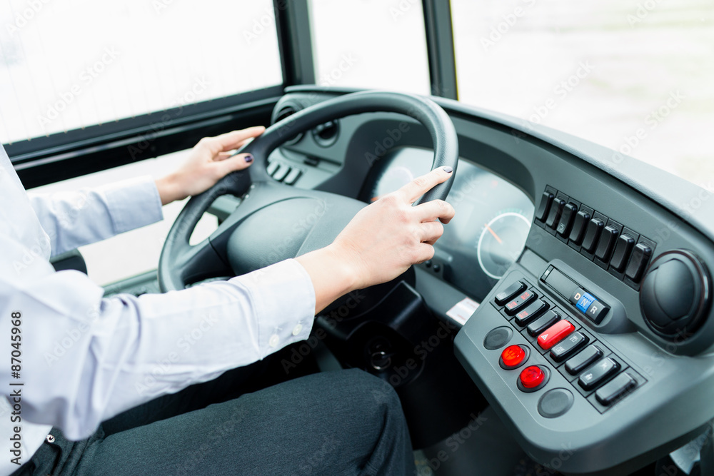 Busfahrer im Bus Cockpit am Lenkrad Stock Photo | Adobe Stock