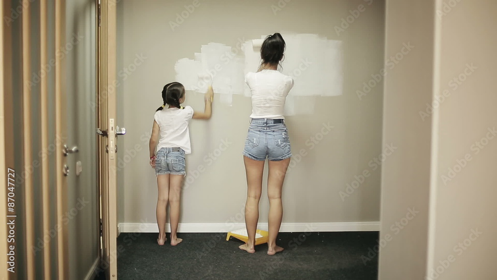 Mother and daughter makes repairs at home Mother and daughter makes repairs at home