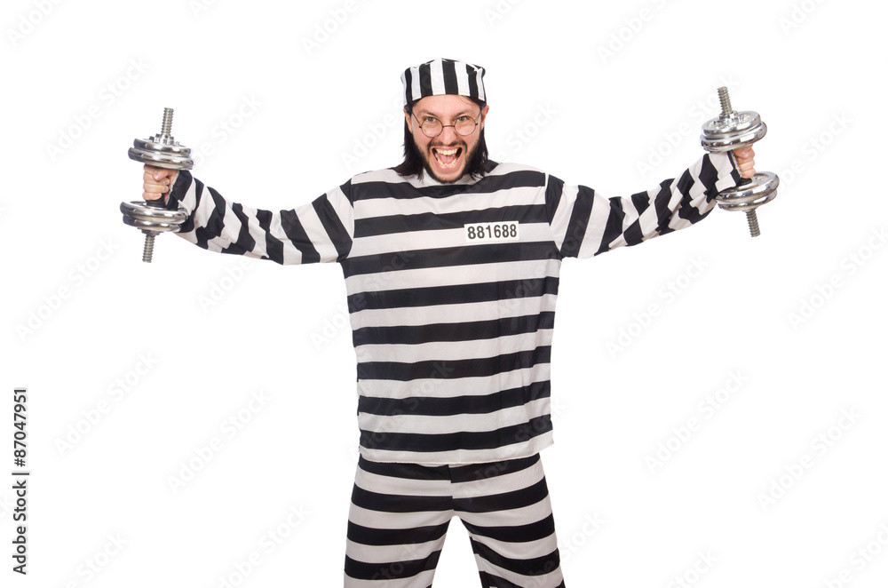 Prison inmate with dumbbells isolated on white Prison inmate with dumbbells isolated on white