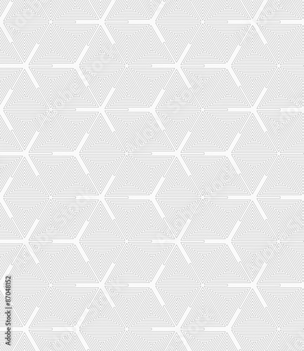 Slim gray triangle spirals forming texture