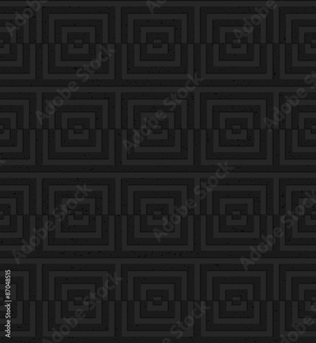 Textured black plastic cut squares